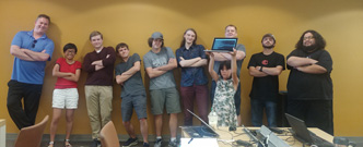Instructor William Kerney and students at the Cyber Fire Puzzle competition